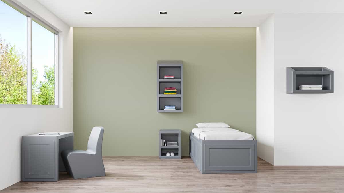 Safe and welcoming behavioral health common area with ligature-resistant furniture in a Florida mental health facility