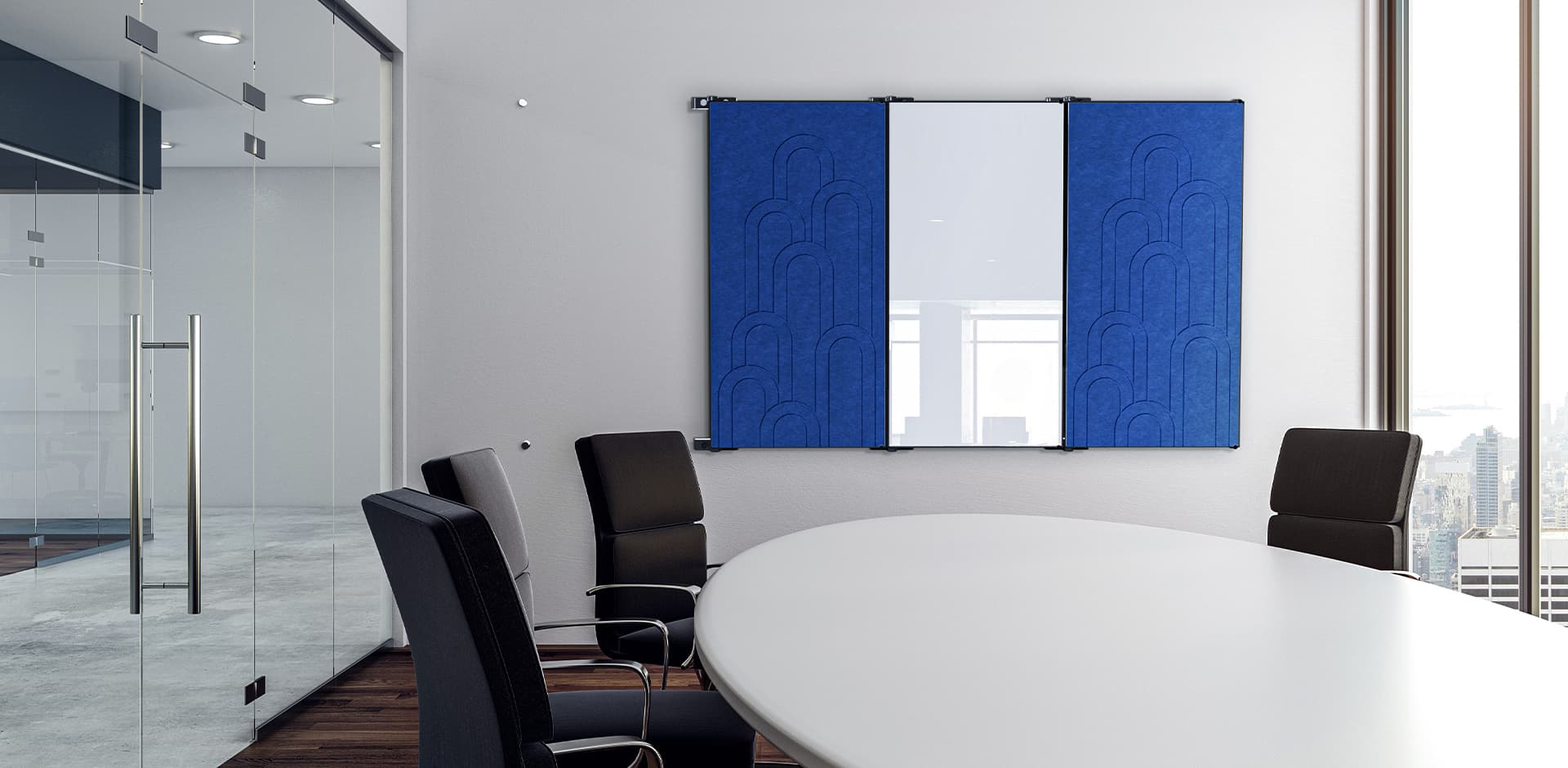 Conference room with blue acoustic felt panels flanking a wall-mounted glassboard