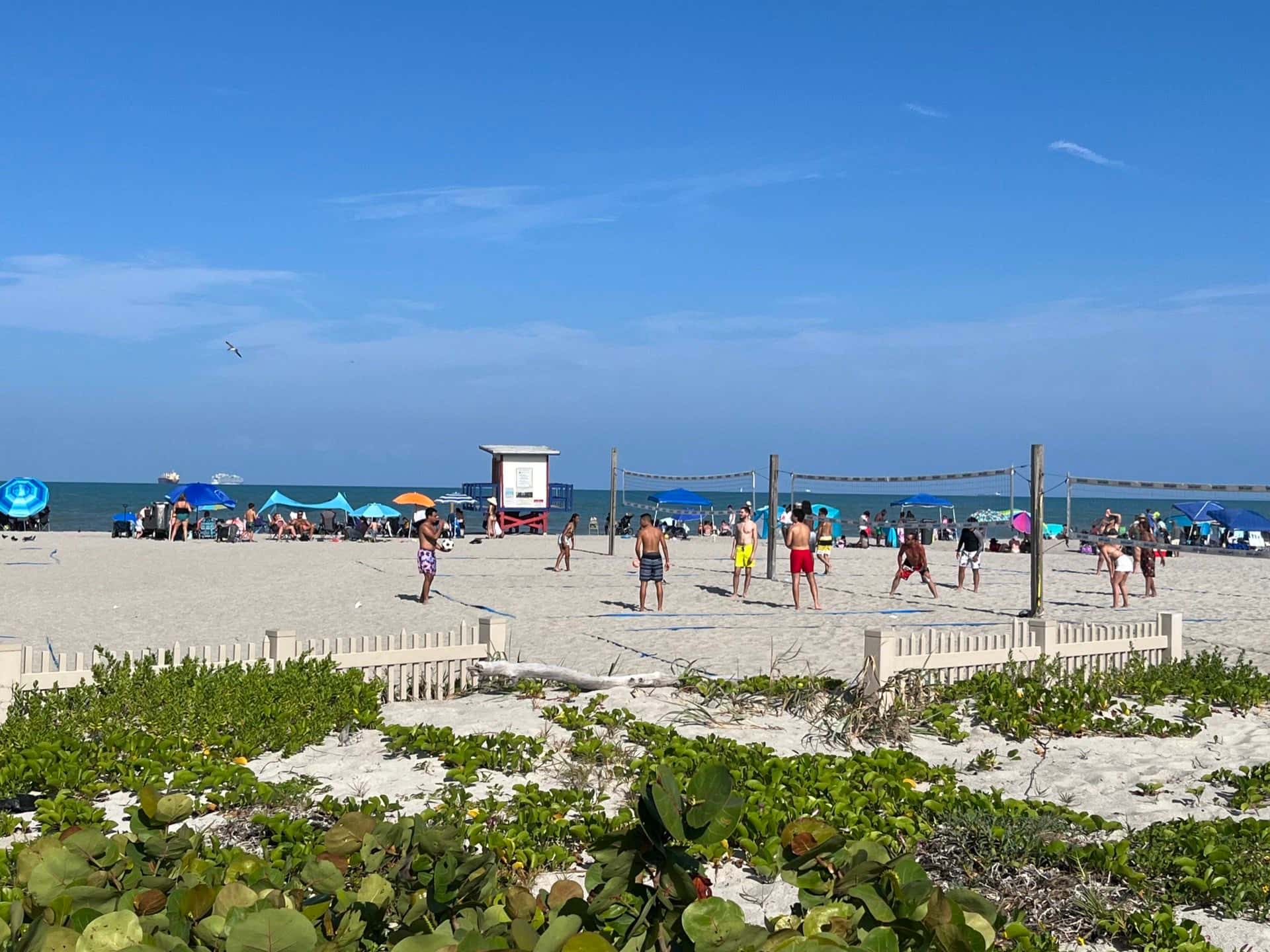 Beachgoers on the sand at Cocoa Beach, Florida