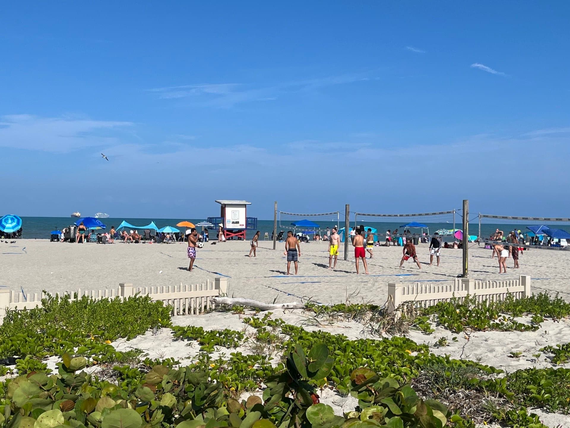 Beachgoers on the sand at Cocoa Beach, Florida